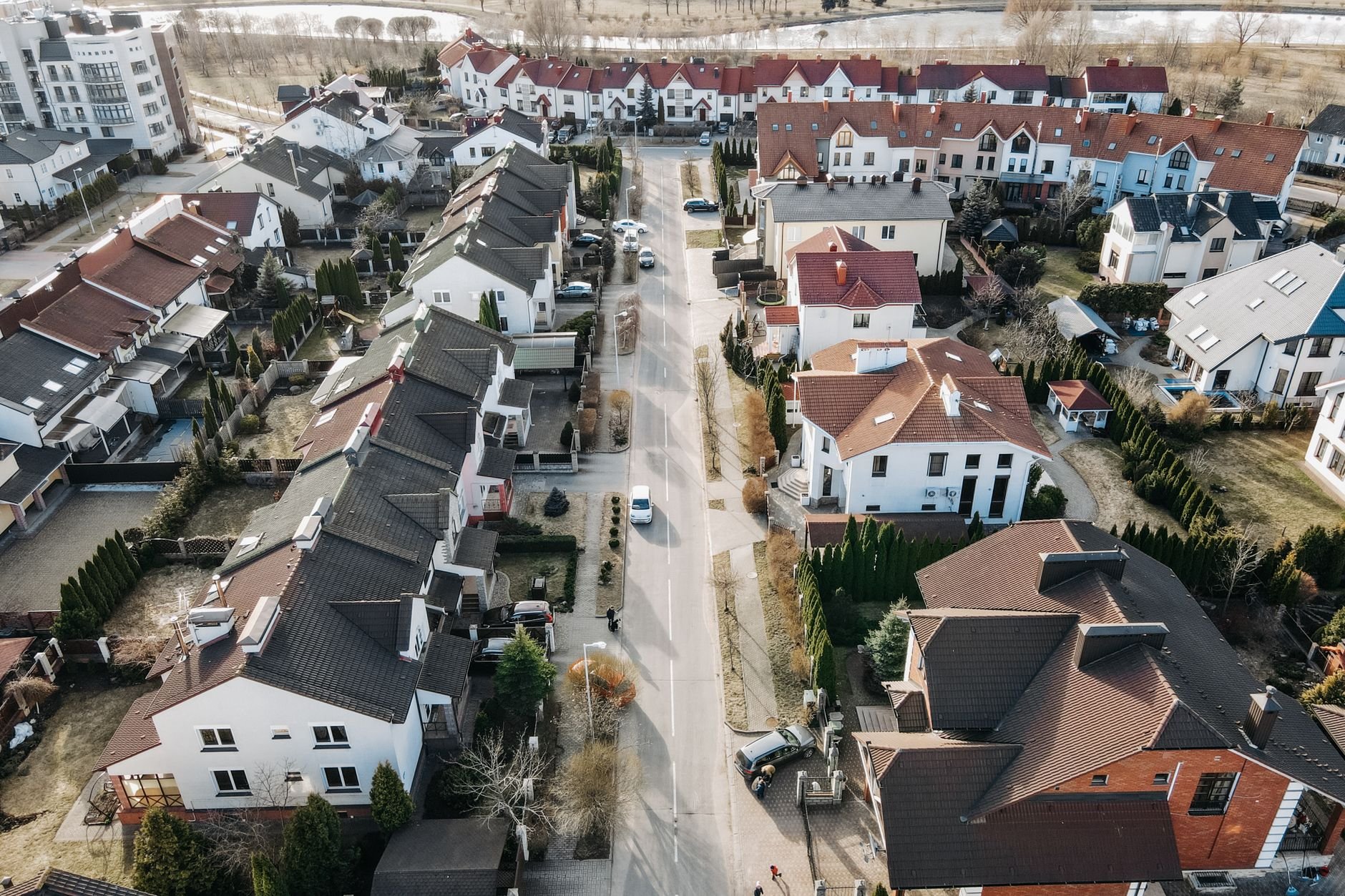 Aerial view of a suburban neighborhood with houses and streets